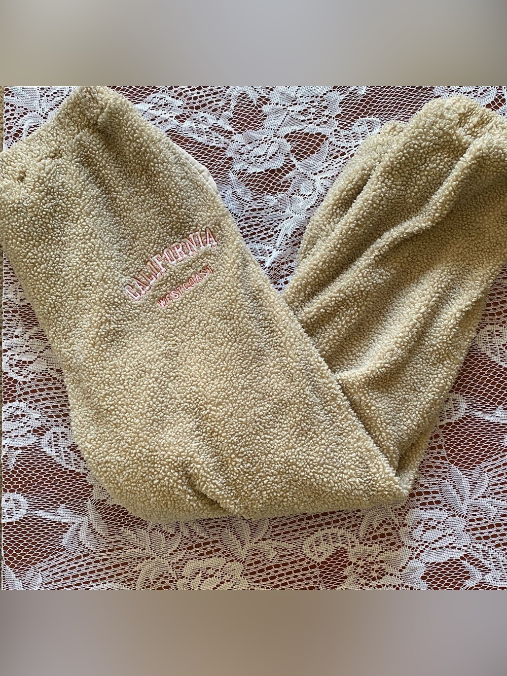 PrettyLittleThing Beige Sherpa Joggers with Pink Embroidery
